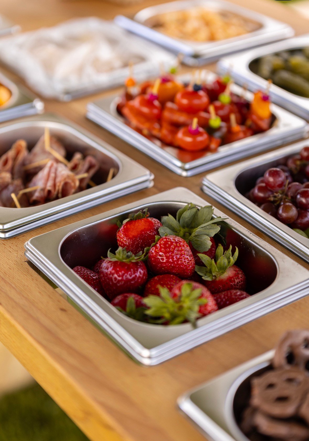 Fresh strawberries on charcuterie cart