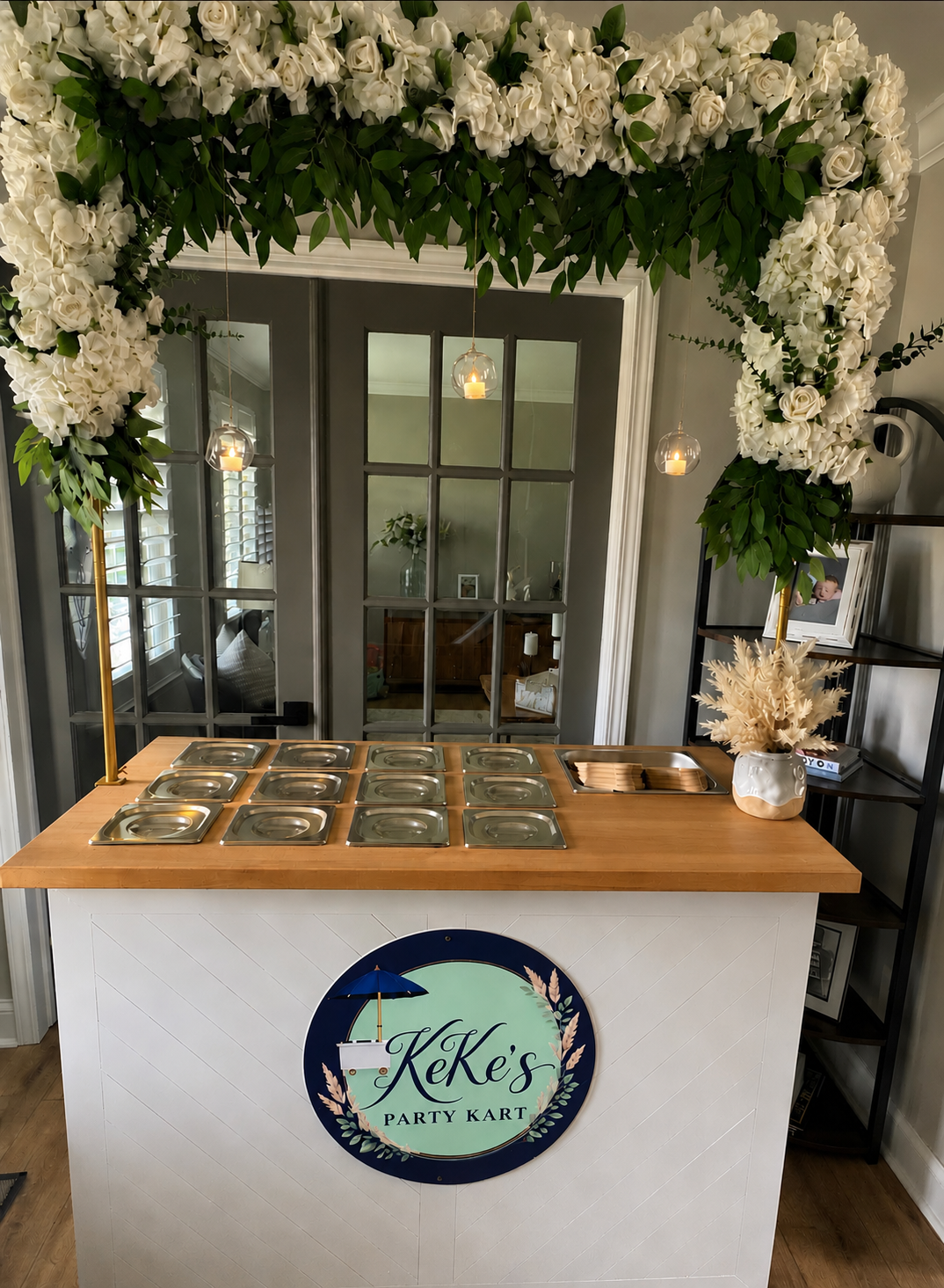 KeKe's Party Kart floral arch event cart